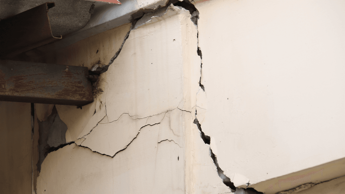 concrete bridge with a large crack in it